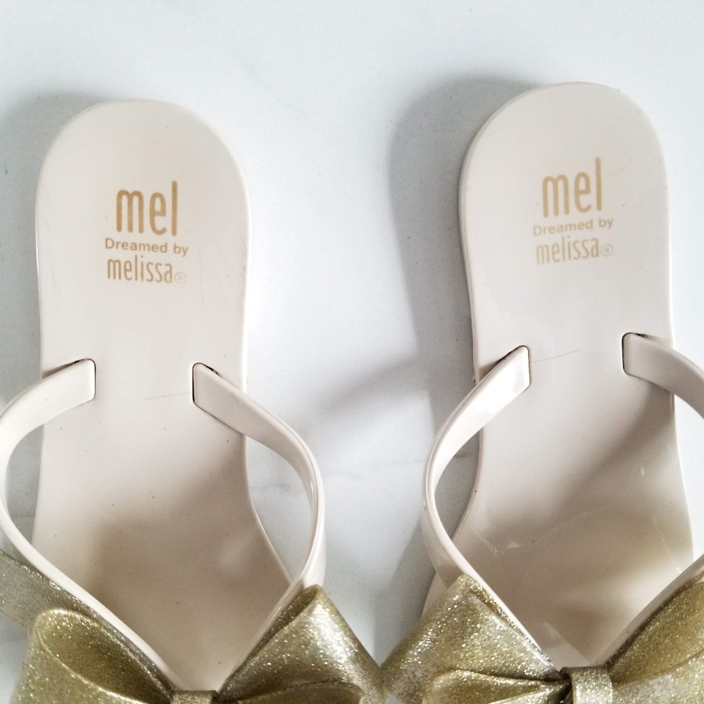 MEL by MELISSA Harmonic Gold Bow III Flip Flops - Picture 7 of 11